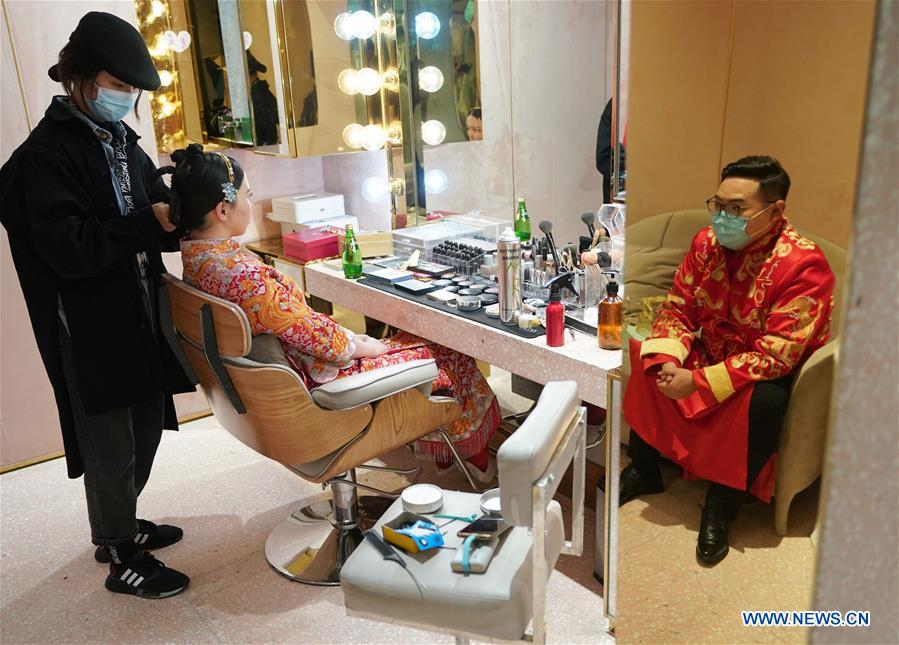 People in Wuhan restart wedding preparations as coronavirus outbreak wanes CHINA-HUBEI-WUHAN-WEDDING SERVICES-RESUMPTION (CN)