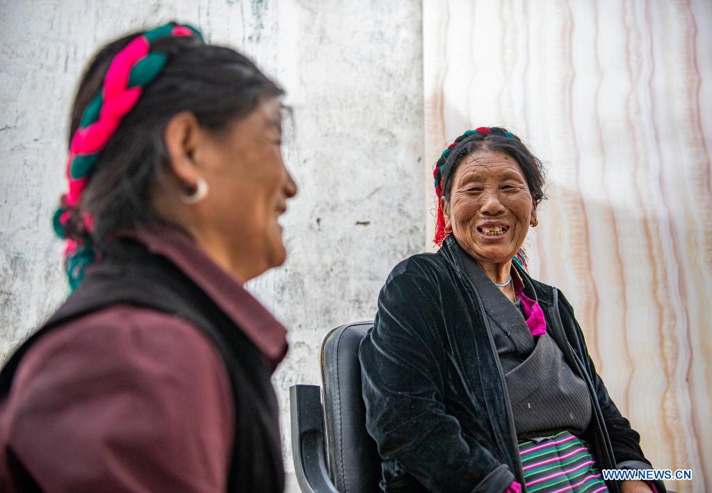 Former serf now enjoys happy life with family in Tibet